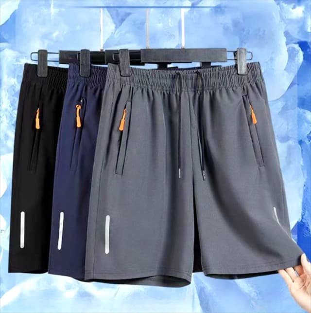 Pantalones cortos deportivos ultrafinos para hombre, Shorts informales de seda de hielo para playa, Jogging, secado rápido, con cremallera, holgados, para gimnasio, Verano